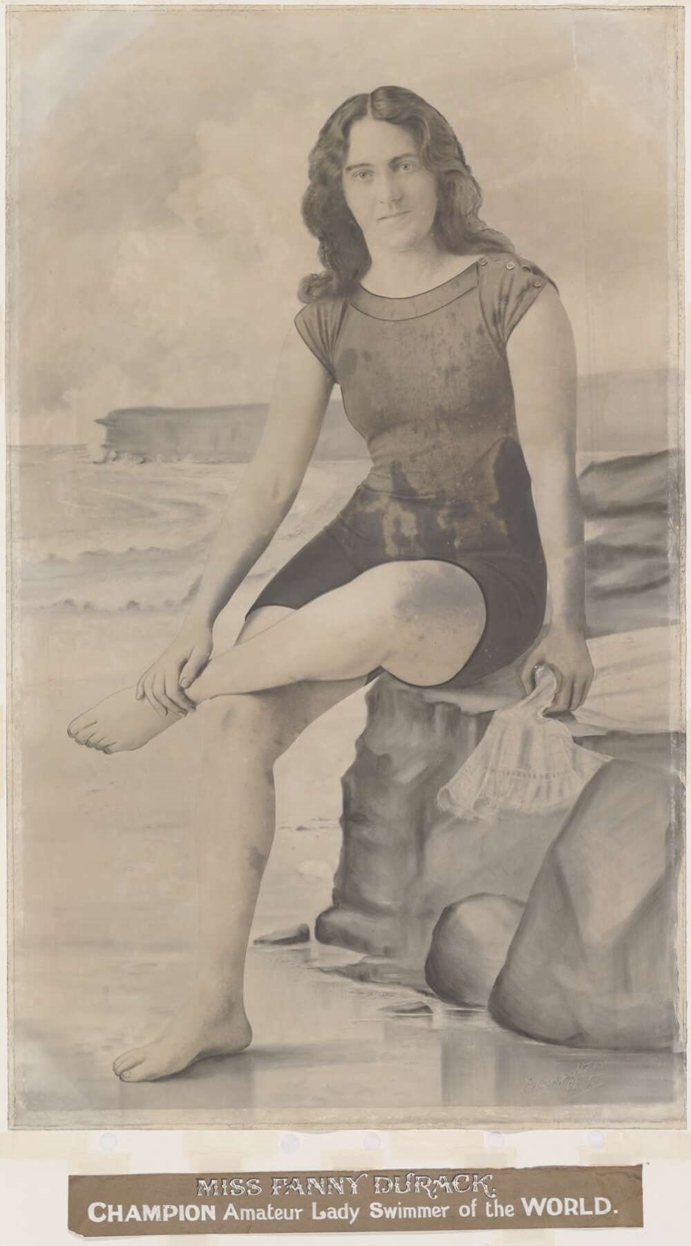 Female swimmer posing for a photograph