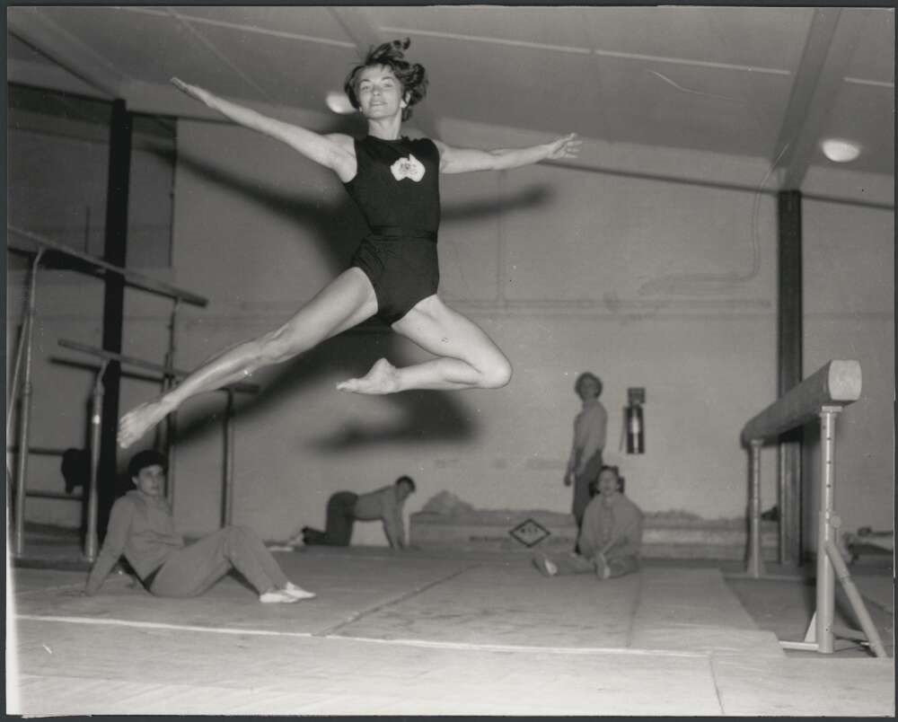 A gymnast jumping