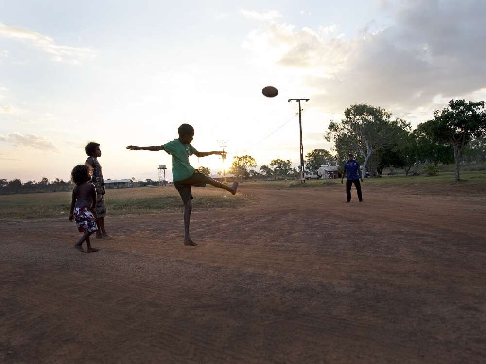 Aboriginal boys playing football